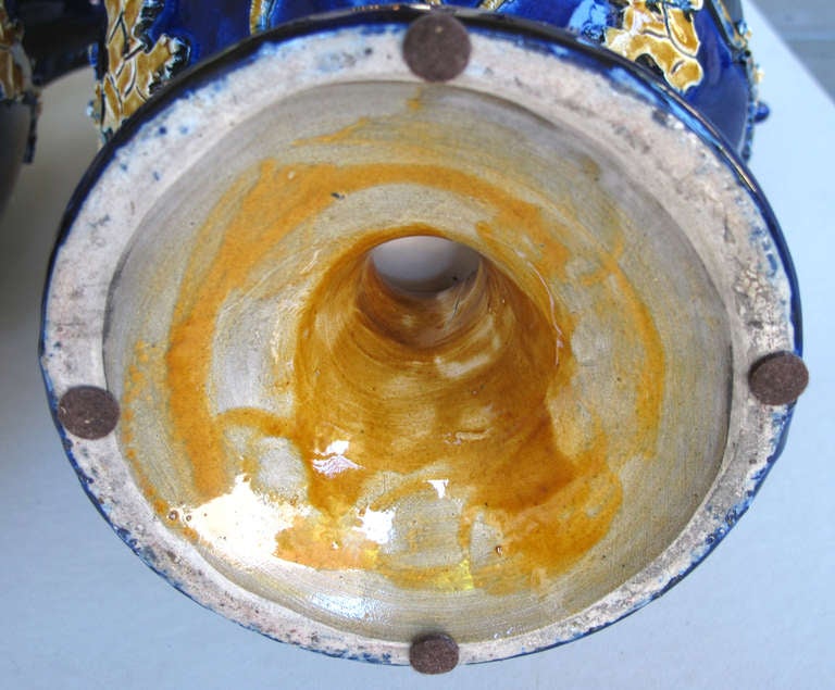 Pair of Italian Cobalt Glazed Majolica Ewers with Raised Decoration