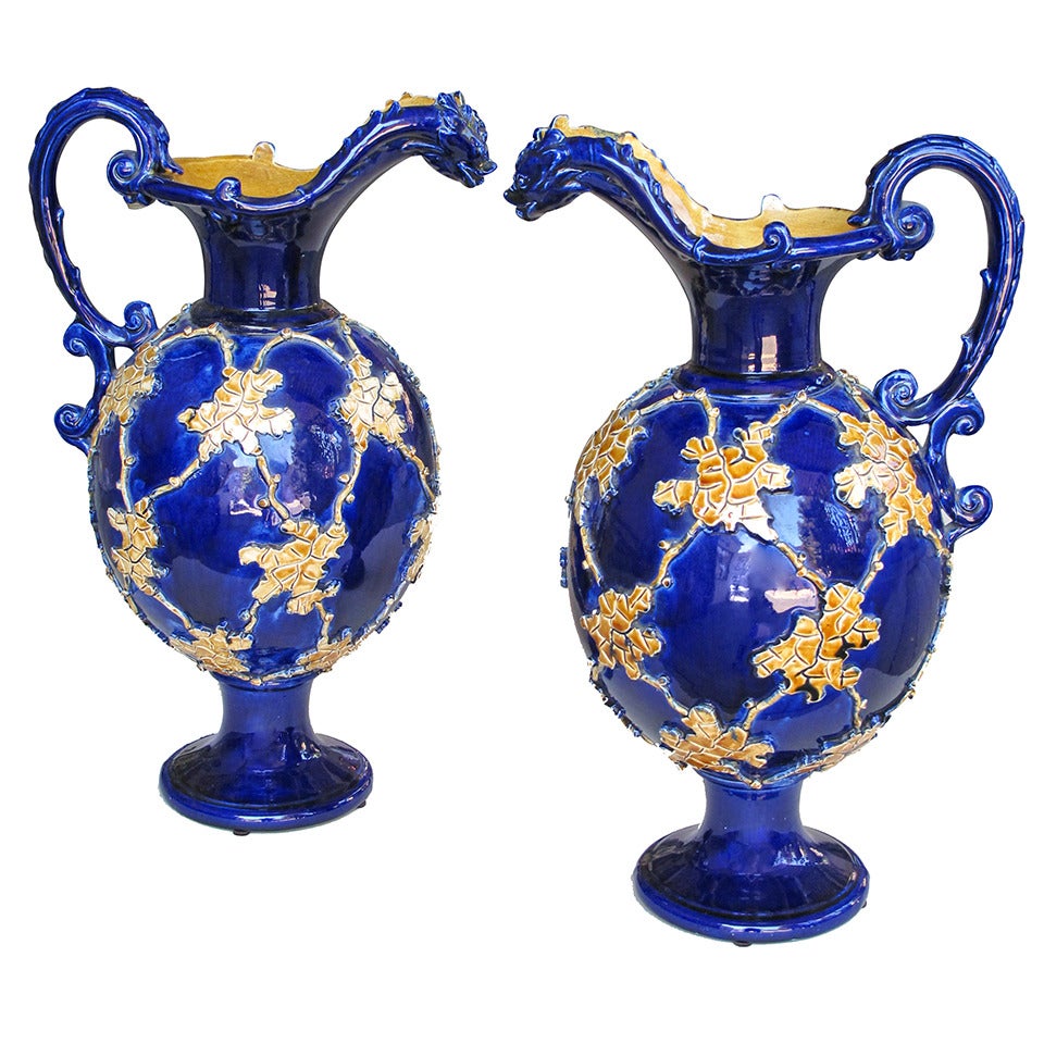 Pair of Italian Cobalt Glazed Majolica Ewers with Raised Decoration