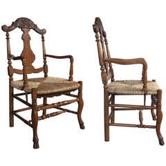 A Charming Pair of French Provincial Carved Beechwood Open Armchairs