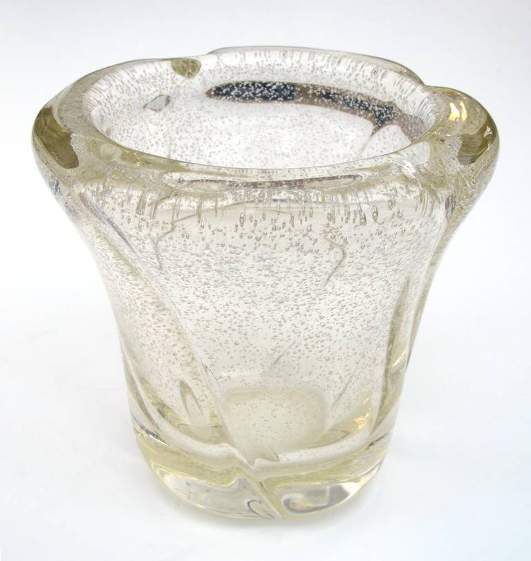 A pair of thickly-modeled French Mid-Century vases with controlled bubbles; acid etched 'Daum-Nancy France'; each of thick spiraling form glass tapering to the base.