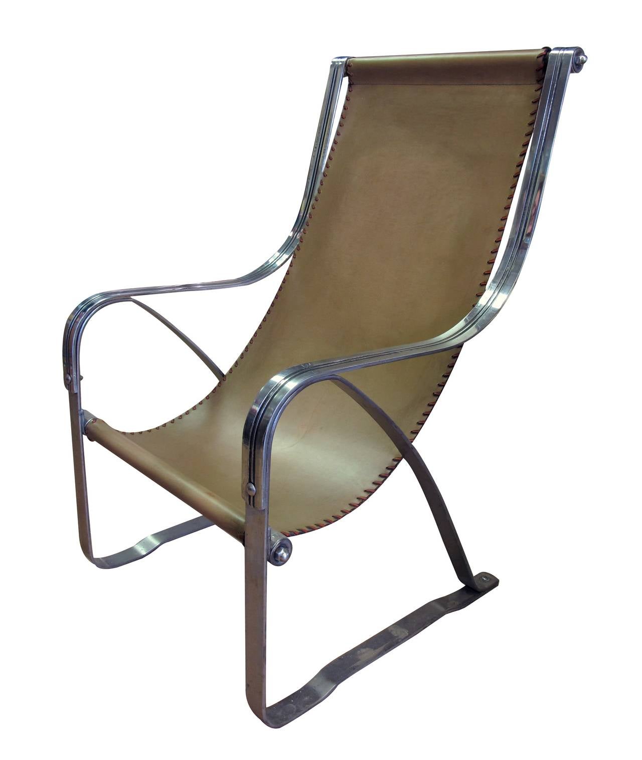 A rare American machine age art deco spring chair by John McKay; chrome plated and band steel frame with later leather sling seat and pillow; for the Miami Pavilion of the House of Tomorrow for the 1933-34 Chicago World's Fair
