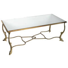 Chic French 1960s Brass Coffee Table with Dolphin Supports and Mirrored Top