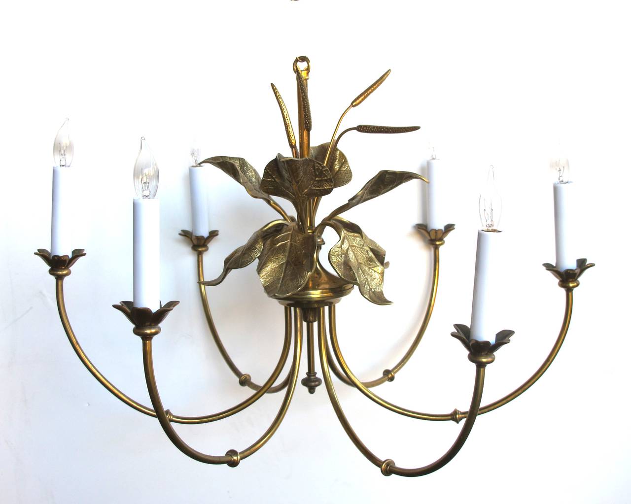 A stylish French mid-century brass six-light chandelier with foliage and cattails by Maison Charles, Paris; the central support emanating lively foliage and cattails surrounded by deeply scrolled arms