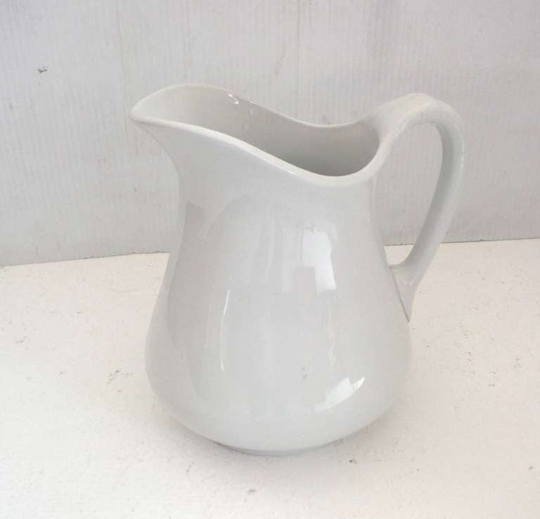 19th century English ironstone water pitcher in a large unusual form. This large form was used for water or milk.