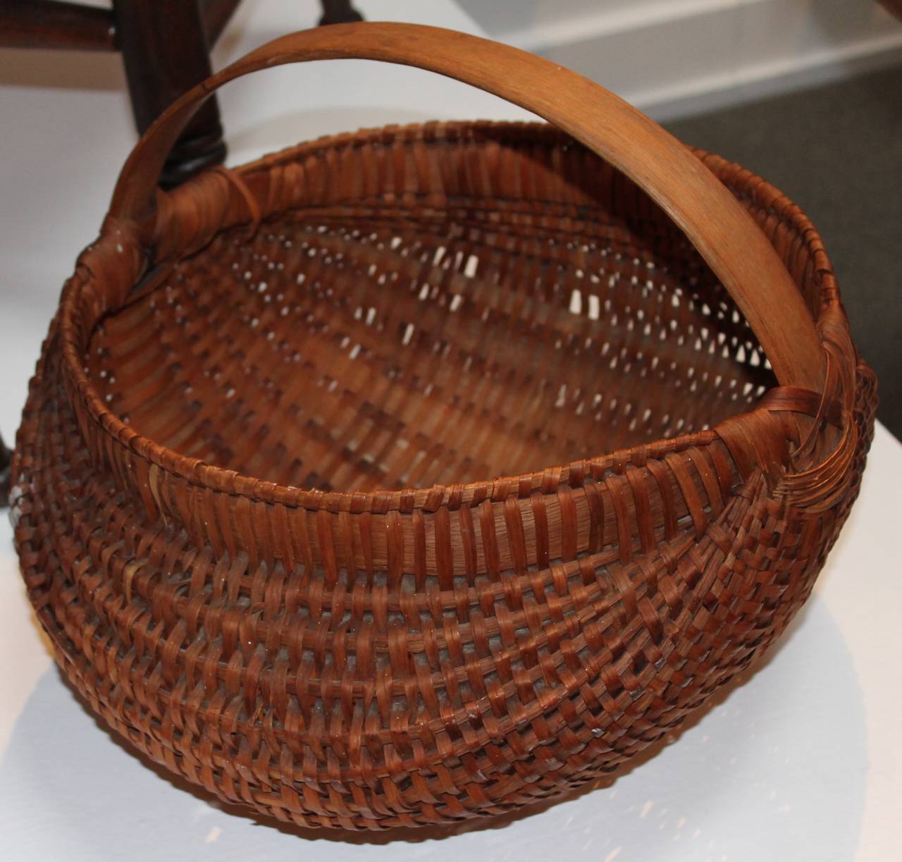This is quite large hiney basket from the third quarter of the 19th century and in amazing as found condition. It was from a private collection in Pennsylvania. Handmade and woven.