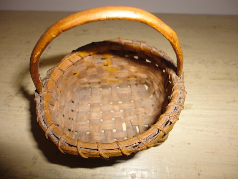 19th century mini mustard original painted basket with velvet miniature carrots. The group of five pieces are sold as one collection. This is a rare find and all are in good condition.