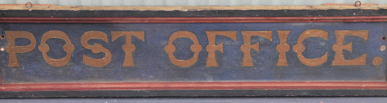 Fantastic original painted Post Office trade sign in great condition. The sign was found in the mid west . This can hang on a wall or on a cupboard .