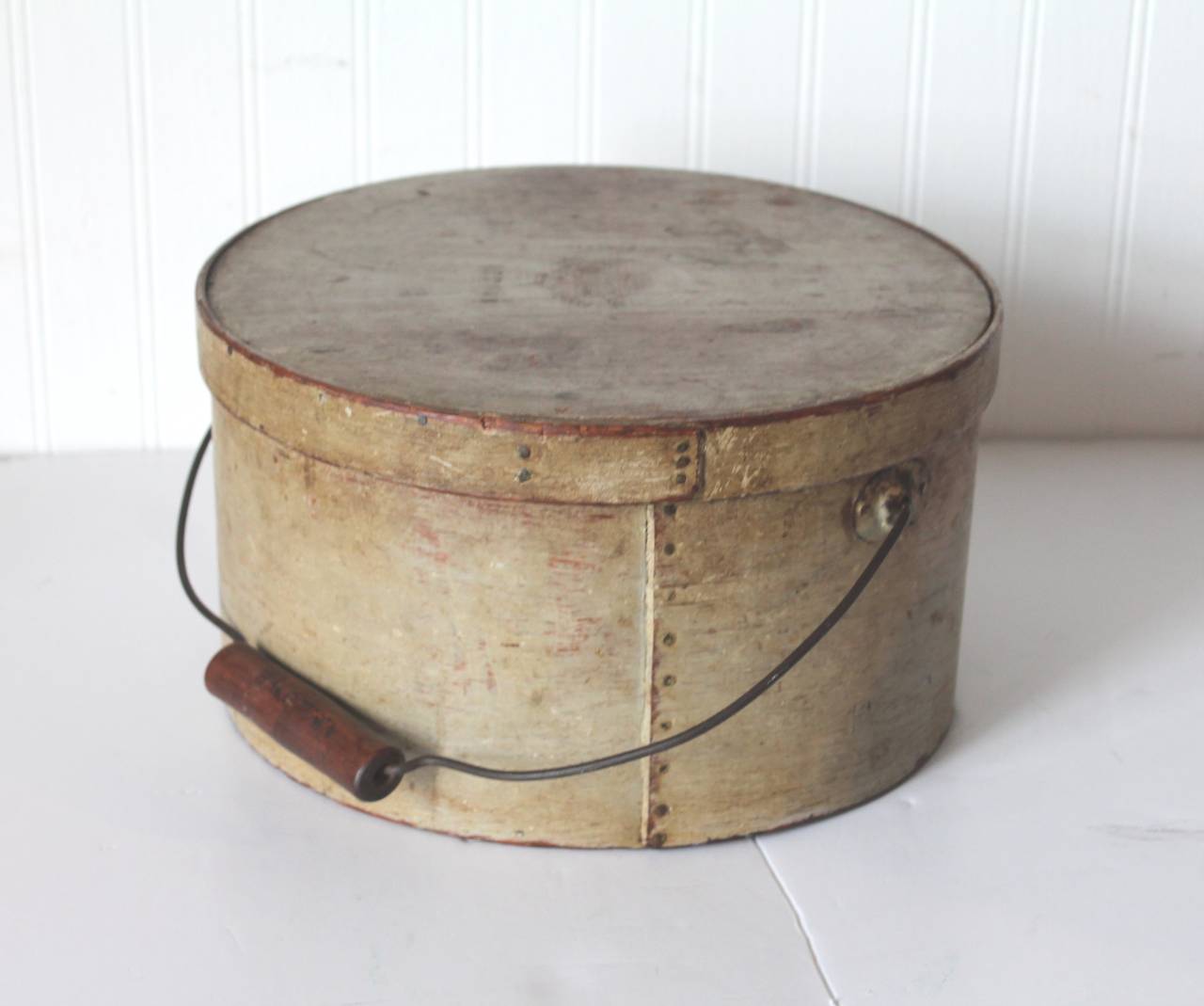 This large 19th century original butterscotch painted signed bail handled pantry box. This wonderful painted box is signed on the lid 