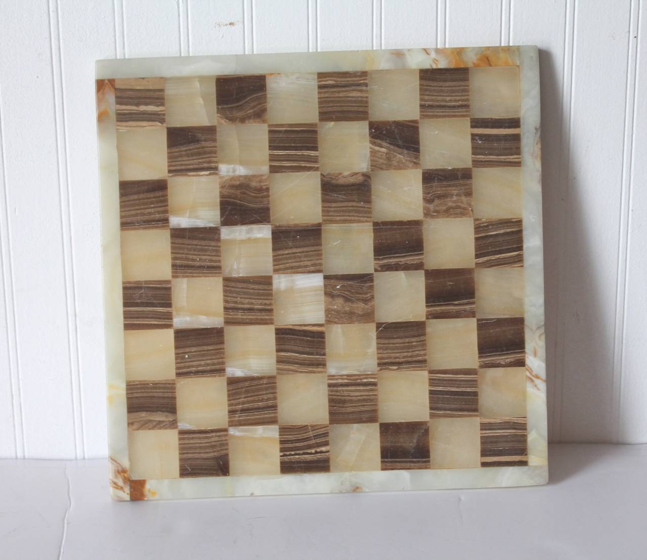 Tri-colored marble game board with a fantastic old surface and color. The back looks like it was handmade. This is probably Mid-Century board.