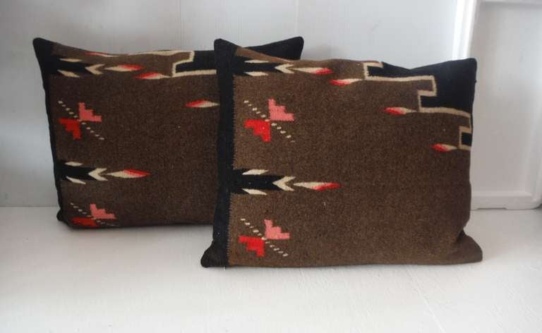 Fantastic early Mexican / American Tex Coco Indian weaving pillows with a chocolate cotton linen backing . Inserts are down & feather fill . Sold as a pair .