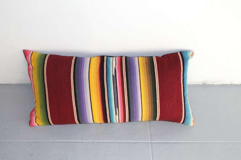 Amazing and colorful Mexican serape bolster pillow. The backing is black cotton linen backing.
