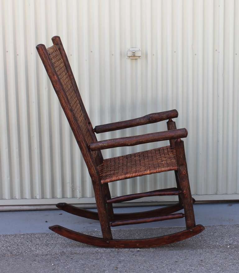 American Monumental Old Hickory High Back Rocker with Open Cane Weave