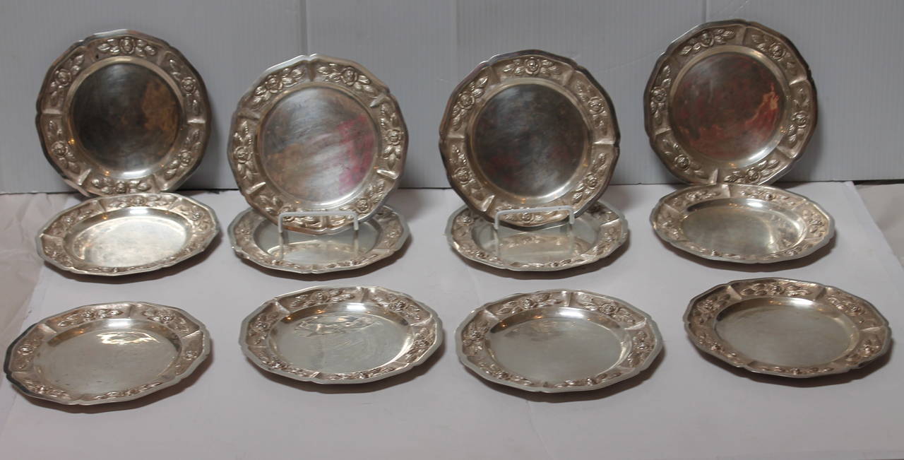 This heavy set of 12 matching sterling silver luncheon plates. The plates are all signed Sanborn Mexican Sterling. Sanborn was founded by Walter and Frank Sanborn in Mexico City, Mexico in 1903.
This set of twelve plates are very heavy and