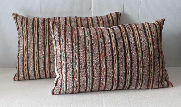 Wonderful cotton rag rug bolster pillows. Cotton linen backing. Two pairs in stock.