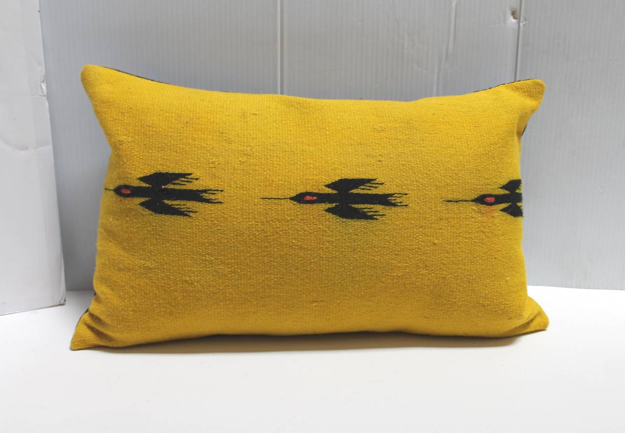 These pillows are so unusual with the mustard ground and black bird in flight. The backing is in a black cotton linen. The inserts are down and feather fill. Sold as a collection of three.