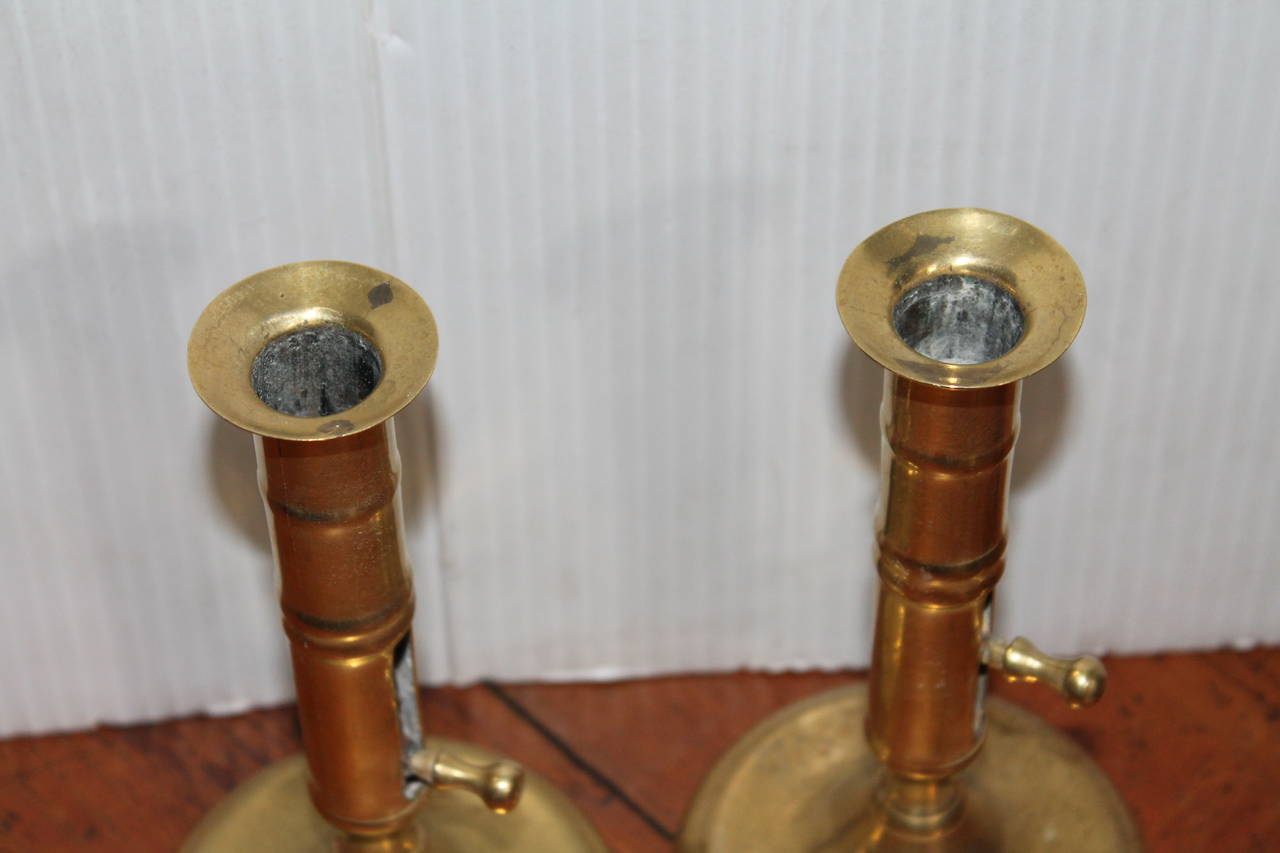 American Colonial Pair of 18th Century Brass Push Up Candlestick Holders