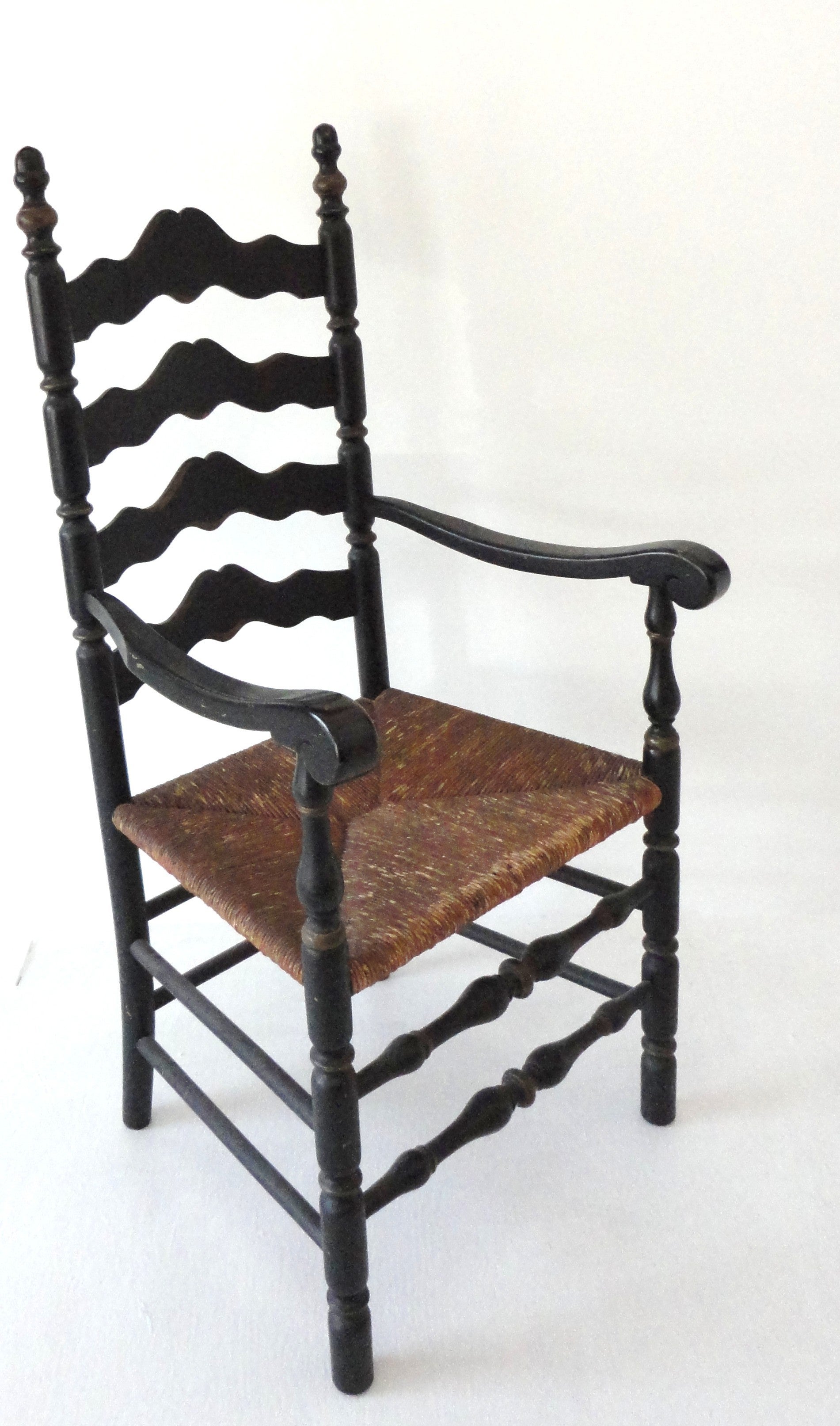 19th c. Original Black Painted Ladder Back Armchair from New England