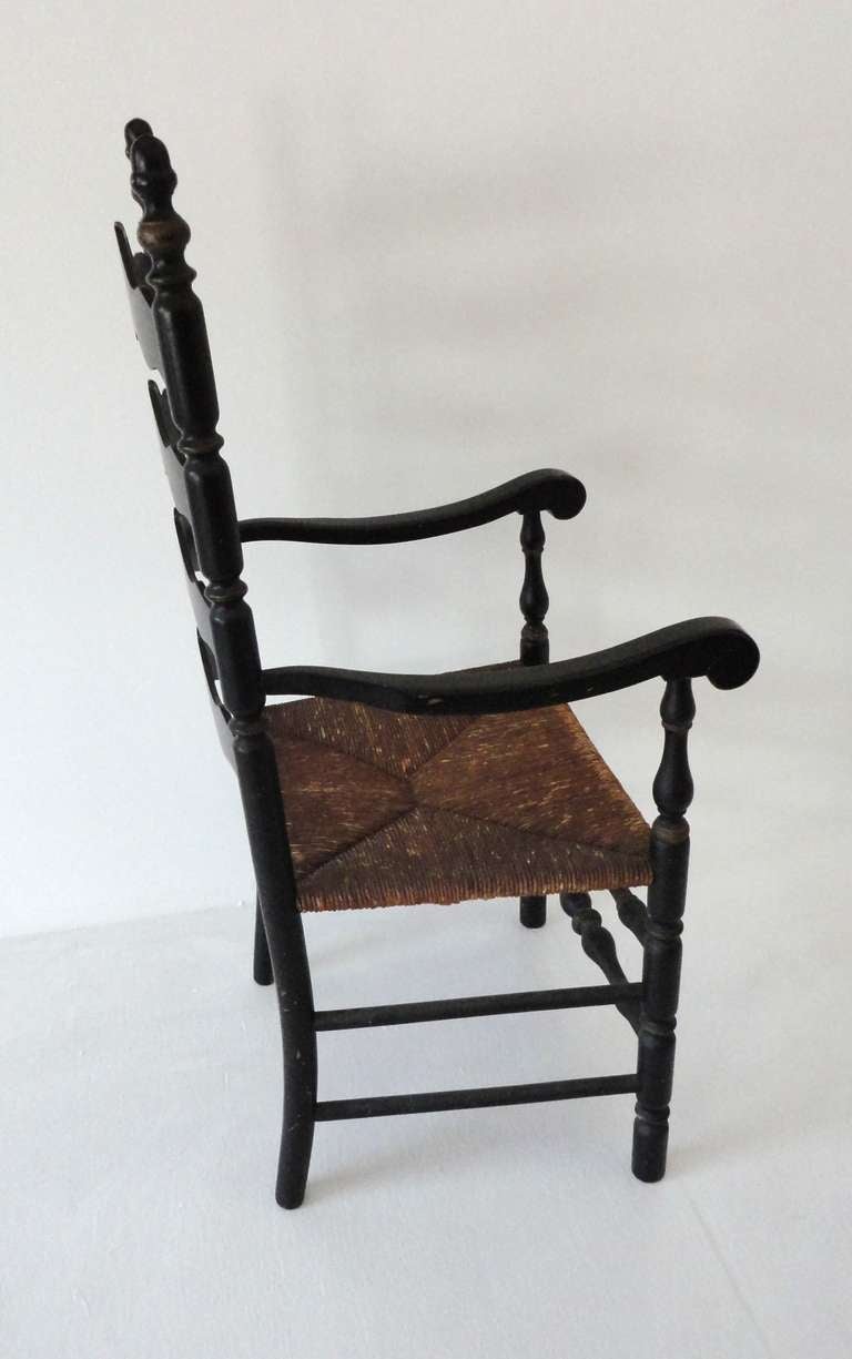 19th c. Original Black Painted Ladder Back Armchair from New England 1