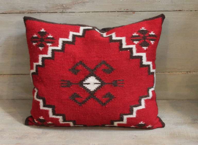 Fantastic rust and brown Indian weaving pillow in a interesting geometric pattern with a zig zag border .  The condition is mint .