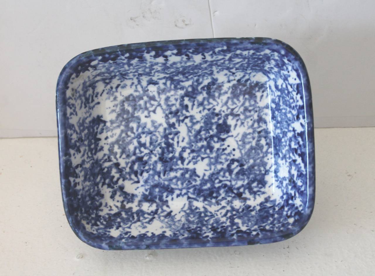 This 19th century blue and white spongeware bake dish is in pristine condition and was found in Pennsylvania. This is the type they wood cook or bake in. Great as a serving bowl.