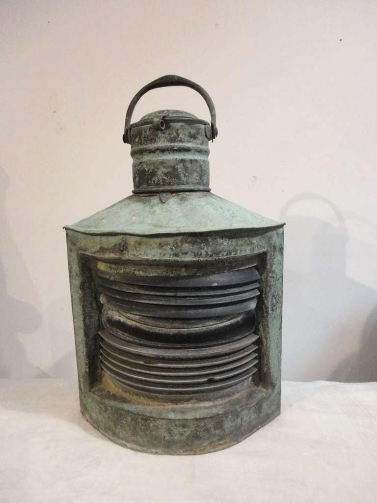 Fantastic 19thc copper with amazing worn crusty patina surface. This cool lantern could be electrified or a candle could be put inside.The amazing surface is untouched but could also be polished.The inside has a wonderful wood & copper base .The