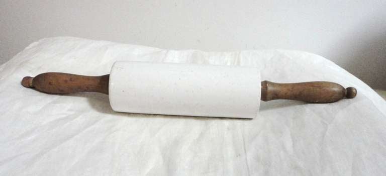 This wonderful 19thc ironstone baking rolling pin is in mint condition and has the original natural pine handles with a wonderful untouched patina.These are quite rare to find especially in this mint condition.