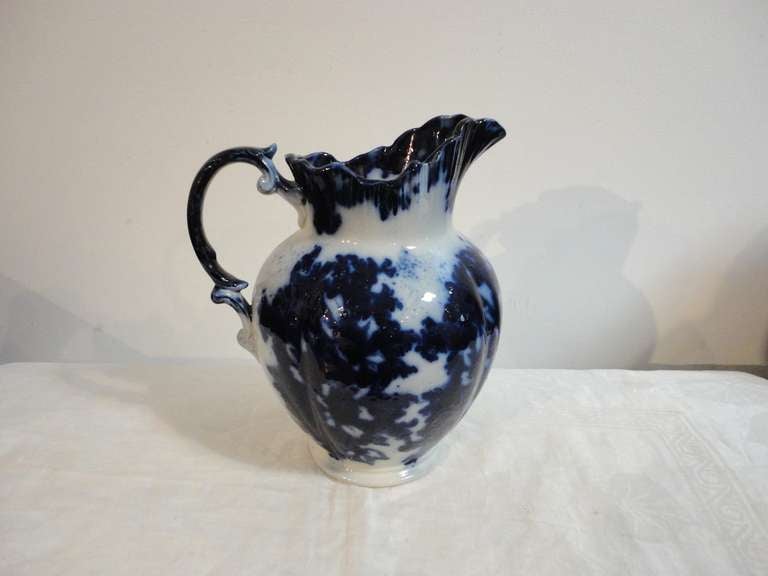 flow blue pitcher and bowl
