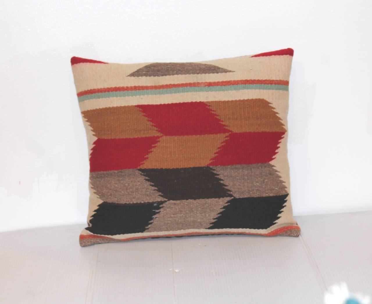 This is a amazing pair of Navajo weaving pillows. The tumbling block pattern is really great. The backing is in a brown cotton linen. Sold as a pair.