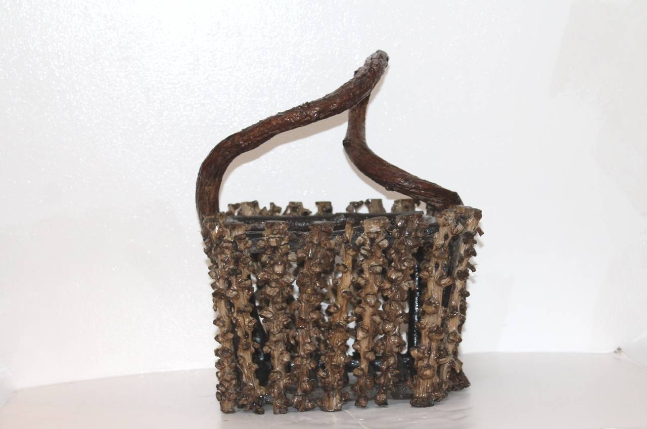 This cool rustic root and grapevine basket was found in Northern California at a closing vineyard winery. Great rustic look and in fantastic undisturbed condition. Such a unusual form.