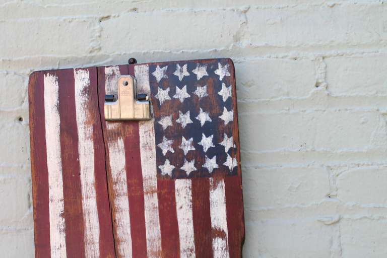 This Americana patriotic themed work board/clipboard shows an original hand painted twenty-star flag and was completely hand constructed with all original hardware intact.  A vintage IDL clip was added at a later date and could be removed, though