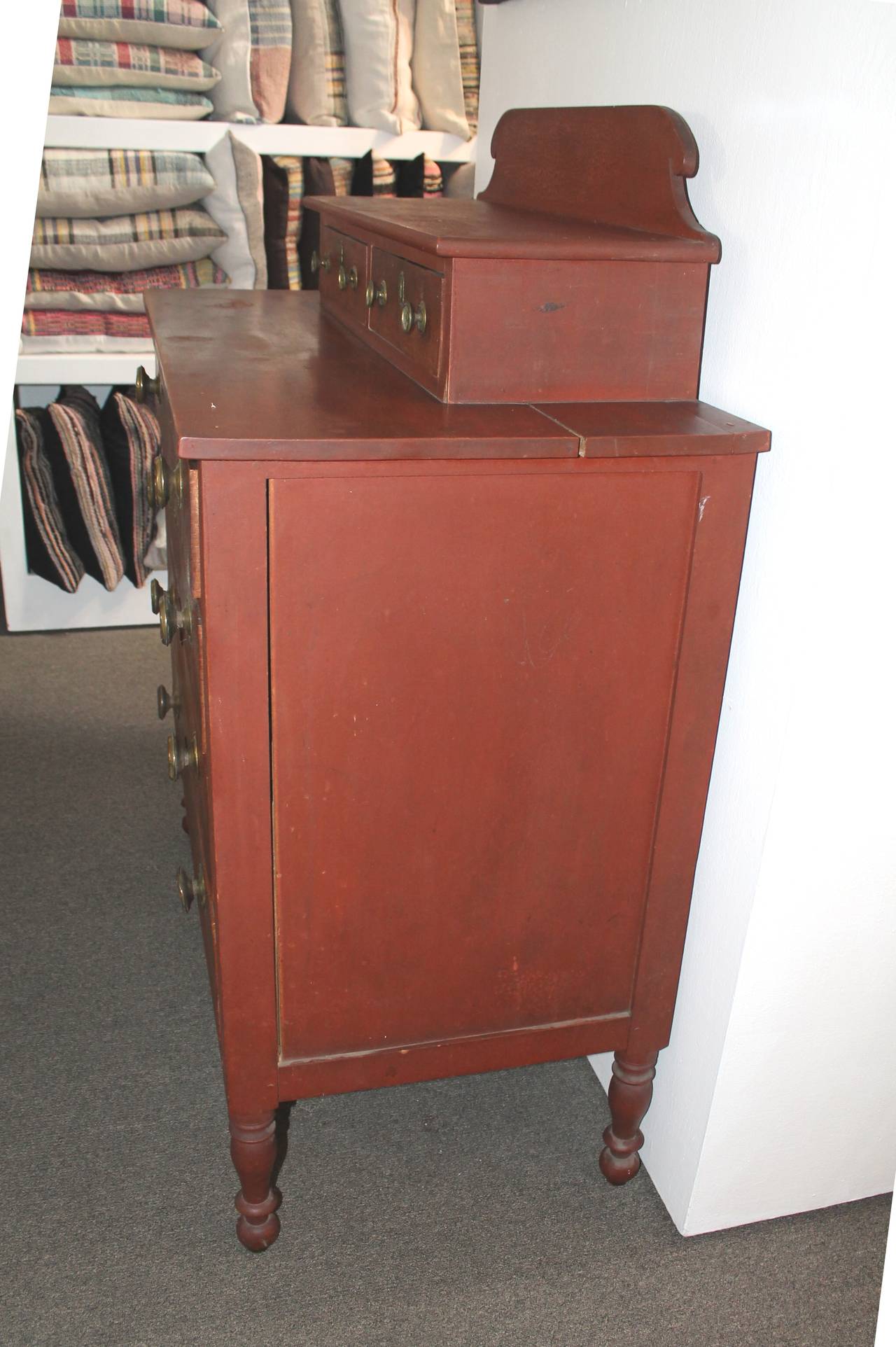 red painted chest of drawers