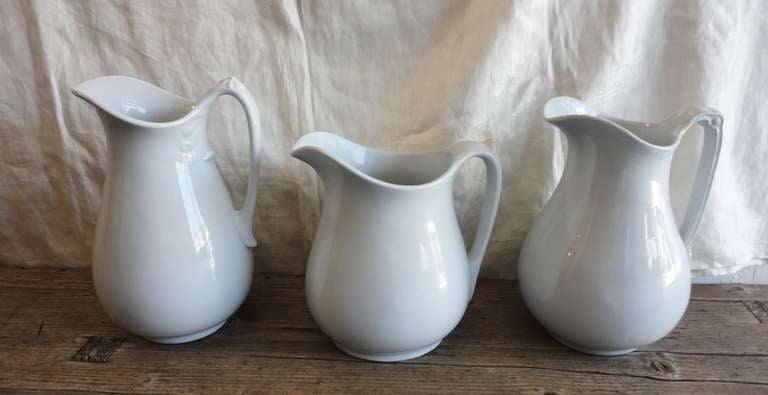 These three marked English pitchers are in outstanding and pristine condition from the mid to late 19th century.

The first measures 13