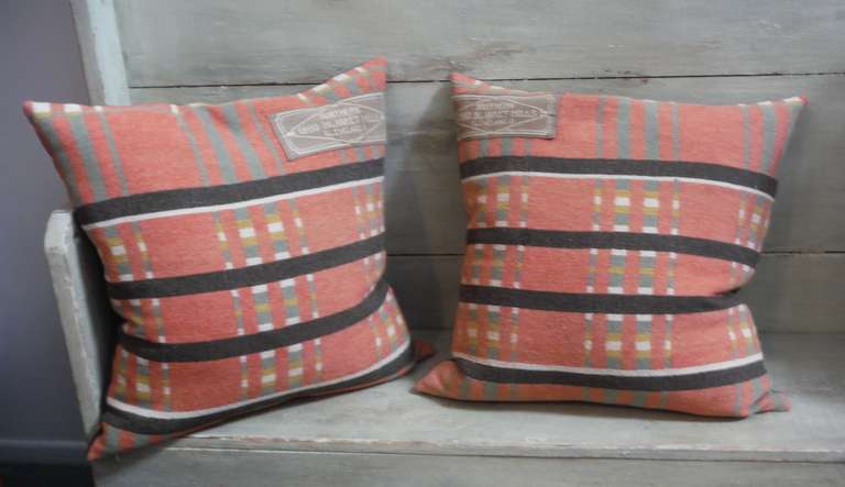 These pillows are constructed from a beautiful muted tone plaid horse blanket from the Northern Ohio Blanket Mills dating to the late 1800s, Ohio. At that time in history, Northern Ohio Blanket Mills was the leading manufacturer of woolen horse
