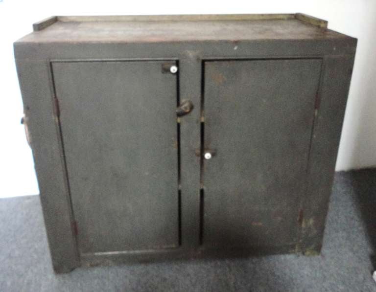 Wonderful and very early 19th century painted inside and out cupboard with all original hardware from Pennsylvania. It looks like it may have been a built in from a farmhouse or very early log frame house. This patina is the best and the cupboard