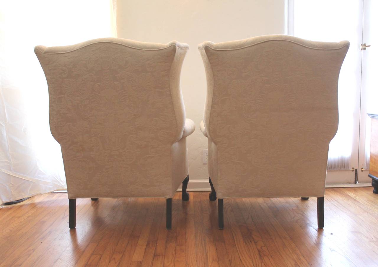 Hand-Carved Pair of Monumental Damask Wing Chairs