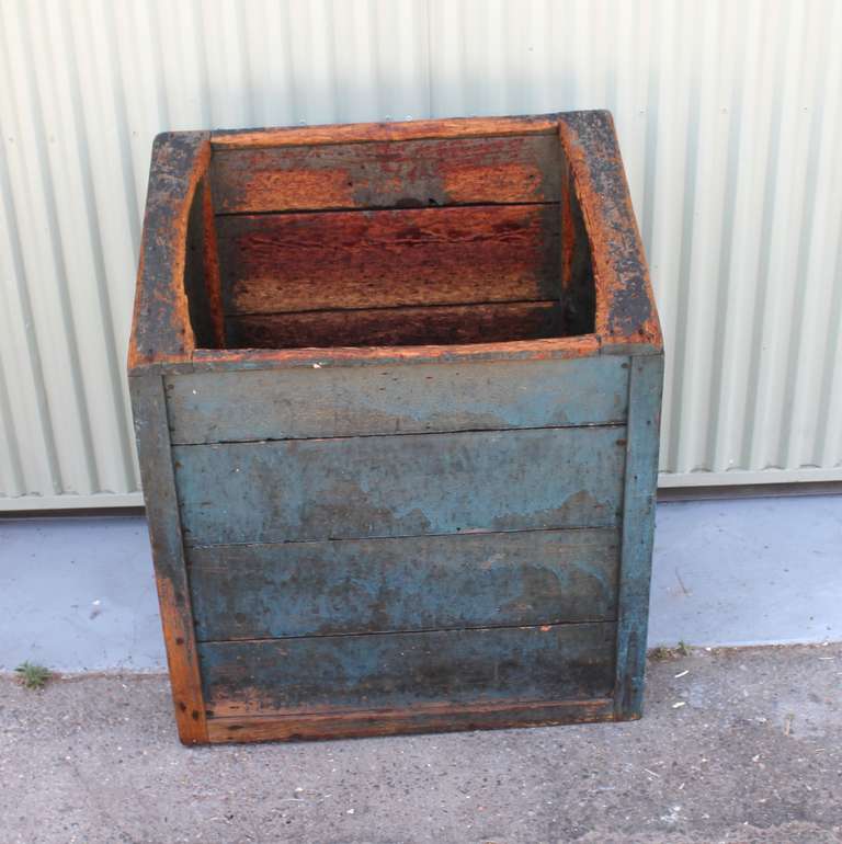 This early 19th century Pennsylvania wood bin shows all original robins egg blue paint and an untouched worn surface rich with character and an exceptional patina.  While also original, the back of the piece has been painted with a gray washed