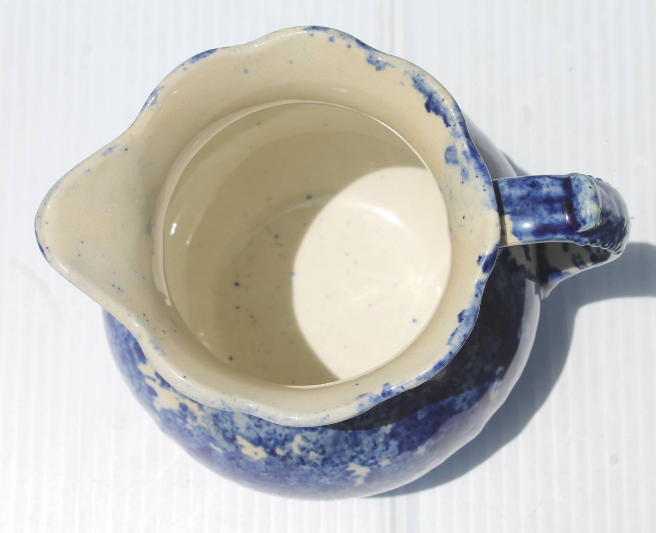 19th century sponge ware fat and round milk or water pitcher. The condition is mint. This was found in Pennsylvania.