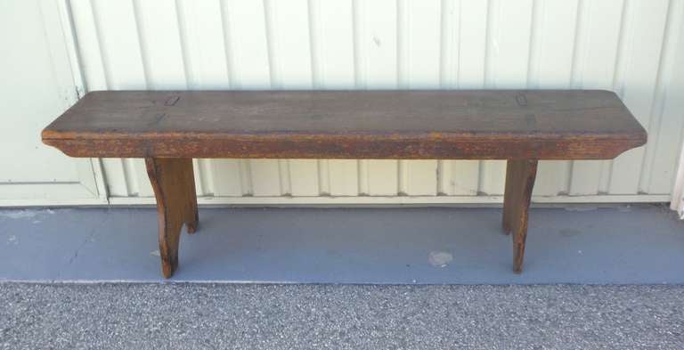 This early and wonderful original painted water or bucket bench was found in Pennsylvania .The construction is square nail and mortised legs through the seat . This bucket bench has a wonderful original undisturbed patina and is in good sturdy