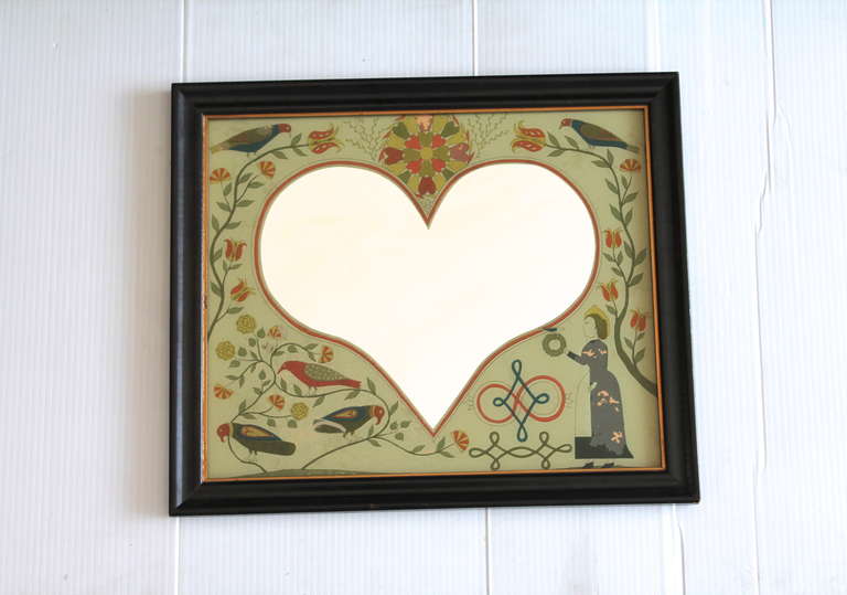This Pennsylvania dutch  reverse painted mirror has fraktur style hand painted images with birds ,tulips,hex signs, and German Dutch tulip vine border. This is most unusual and retains most of it's original painted surface. The black original