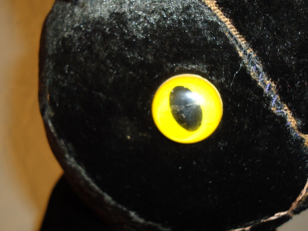 FOLKY EARLY 20THC LARGE VELVET CAT W/ GLASS EYES 1