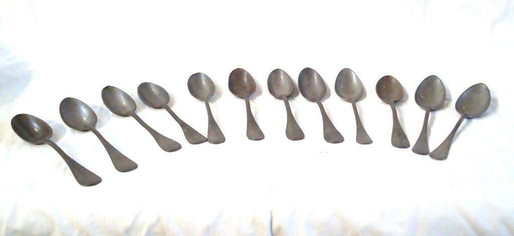 EARLY AND RARE SET OF TWELVE PEWTER SPOONS IN GREAT CONDITION.FANTASTIC  SET OF MATCHING SPOONS.GREAT ADDITION TO ANY AMERICAN PEWTER COLLECTION.