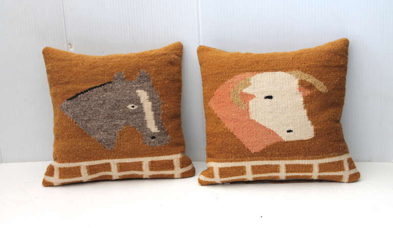 These  wonderful and most unusual pictorial Navajo weaving pillows are small but very punchy. The horse and bull weavings  were made from one saddle blanket The backing are in tan cotton linen and down and feather inserts.