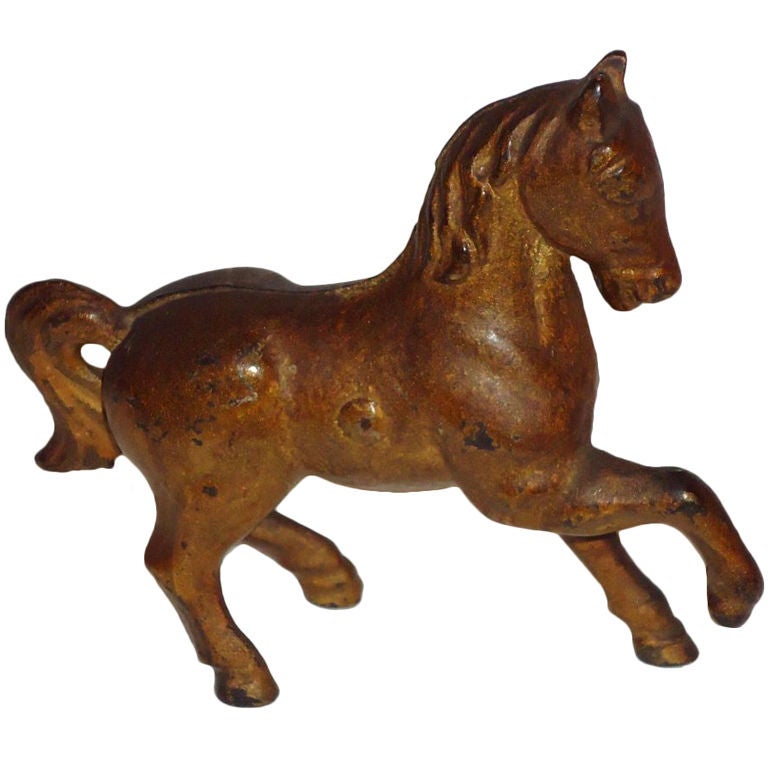 WONDERFUL LITTLE CAST IRON ORIGINAL PAINTED 19THC HORSE BANK.THIS LITTLE GUY HAS ALL ORIGINAL PAIT AND GREAT FORM .THE CONDITION IS GOOD.