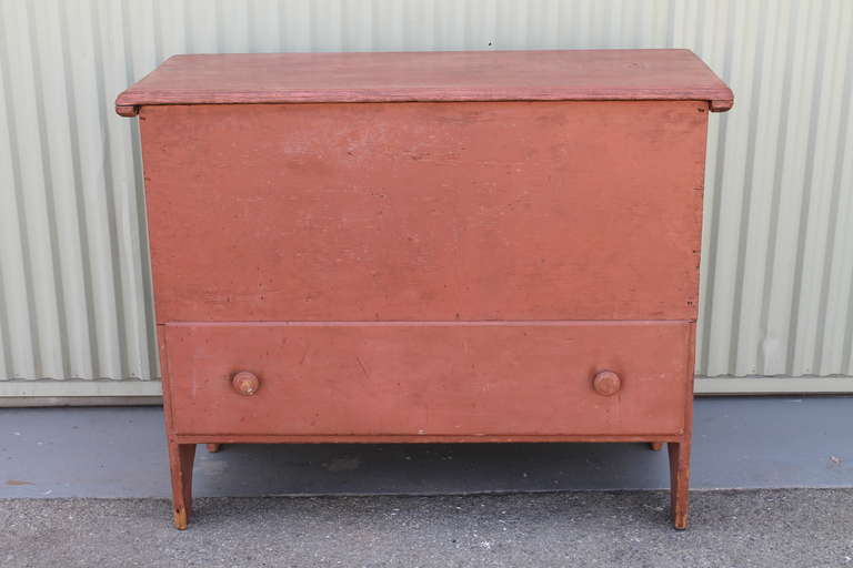 This is amazing untouched salmon painted surface is so difficult to find. This tall blanket chest  with a large drawer in base is in great condition. This  early  chest was found in New England and originally coming from Skinners Auction House in