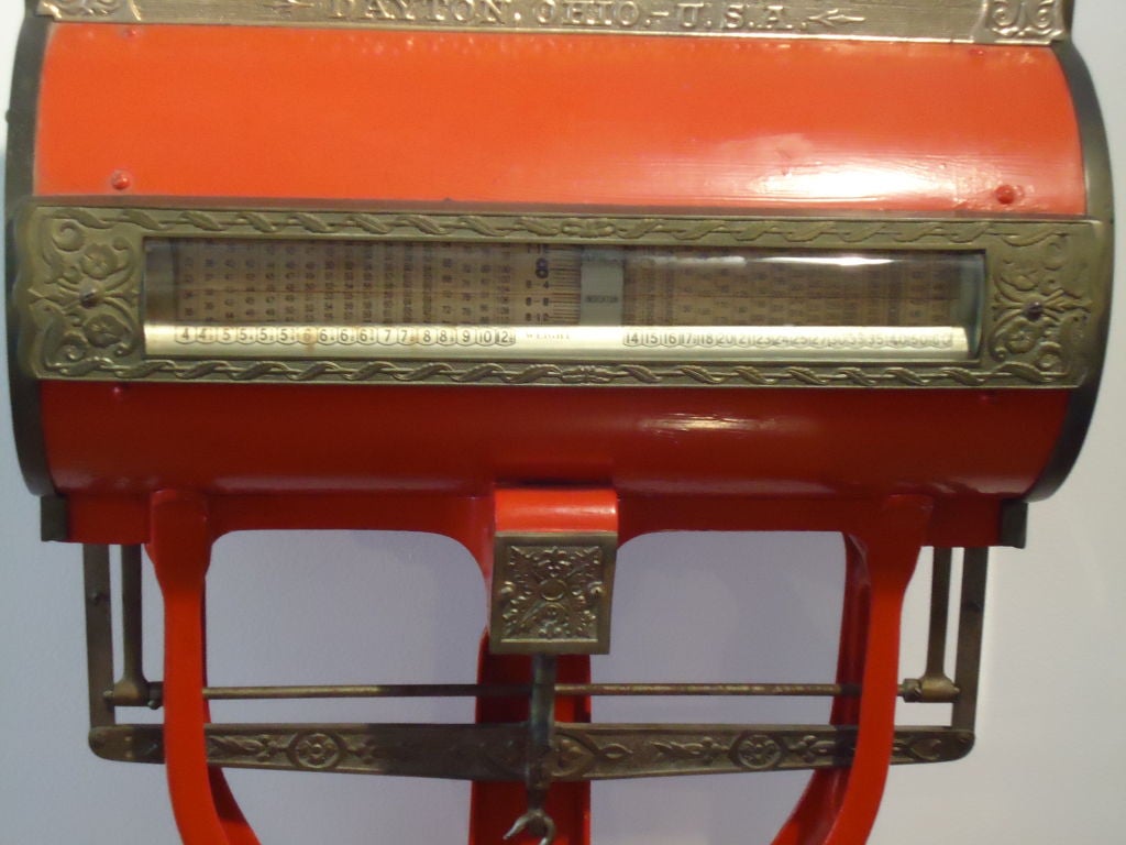 RED PAINTED 19THC IRON & NICKEL PLATED BRASS SCALE W/ UNUSUAL  ROUND BEVEL EDGE MIRRORS ON BOTH SIDES.THE SCALE HAS A LARGE THICK GLASS PLATFORM.THE SCALE IS SIGNED BY 