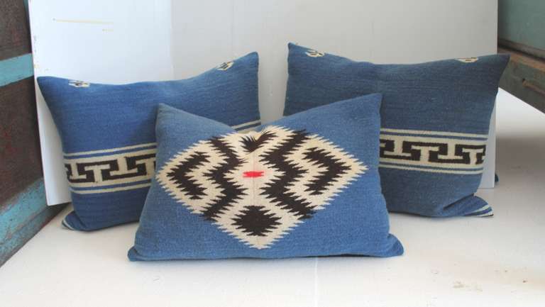 This group of three fantastic Texcoco Mexican Indian weaving bolster pillows have very unusual ,geometric design and are sold as a group of three.The condition are very good with a dark brown cotton linen backing. The insert are down and feather