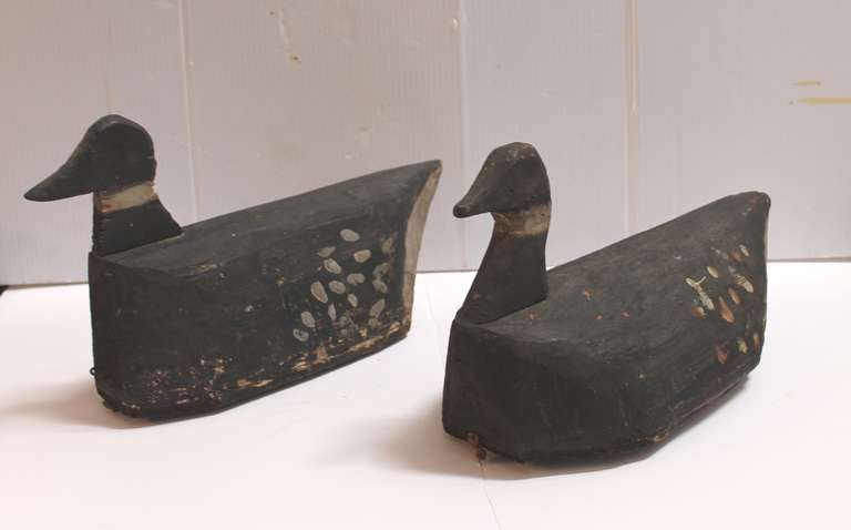This pair of fat ,folky hand carved and painted 19thc  decoys were found in the South and probably southern made but have such great form. These birds have a amazing patina and just untouched surface ! The underside or base has a lead weight on  and