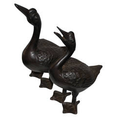 Two 19th Century Cast Iron Folky Door Stops or Garden Ornaments
