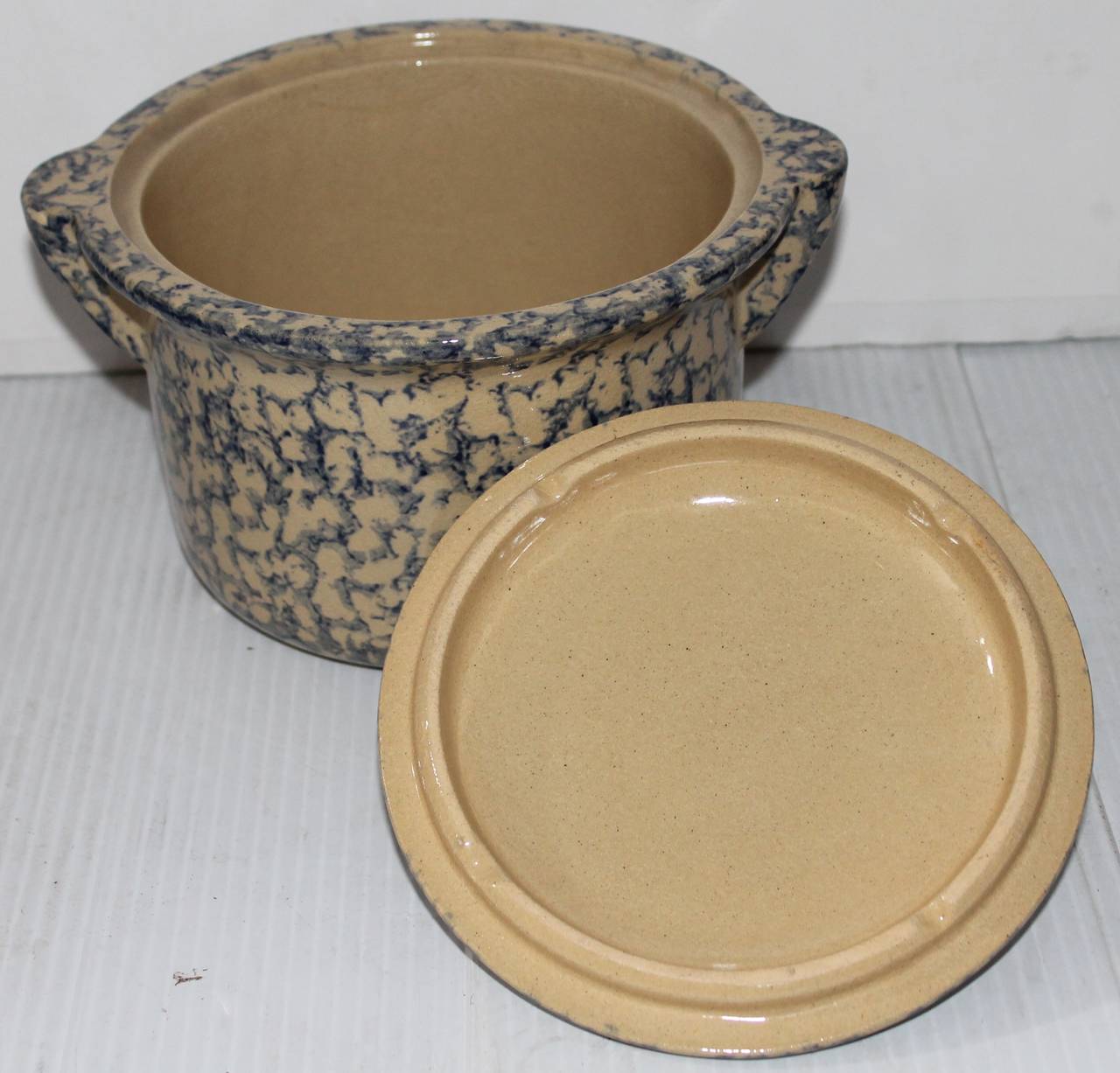 This early 20th century serving bowl comes out of a rare collection of spongeware. This item has been well taken care of and has minor wear consistent with age and use.