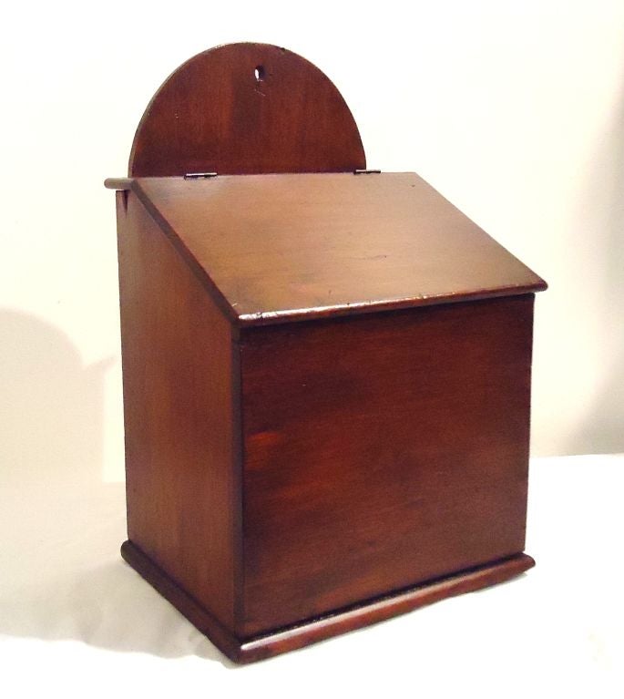 This wonderful handmade walnut wall box has a hinged lift top and is in great condition. This oversize box could be used on a counter or a wall. The construction is early cut nails original hinges. The condition is good with minor wear and tear from